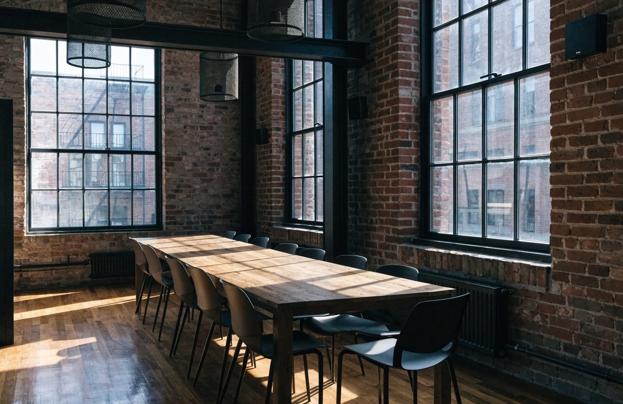 Northern Suite - loft meeting room with exposed brick